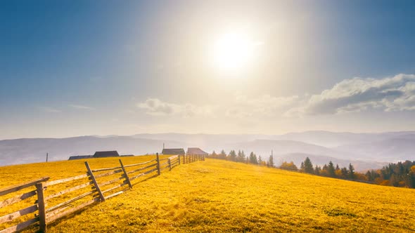 Autumn Yellow Meadow Field with Wooden Fence