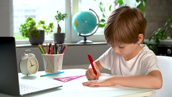 a Child Doing School Lessons at Home