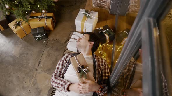 Depressed Man at Home on Christmas