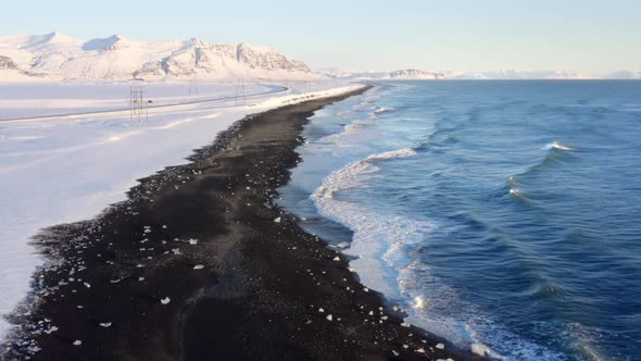 Arctic Icy Winter Scenery Aerial View of Black Snowy Coast