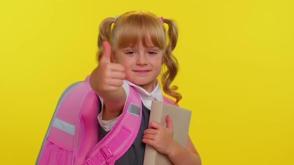 School Girl Kid Looking Approvingly at Camera Showing Thumbs Up Like Sign Positive Something Good