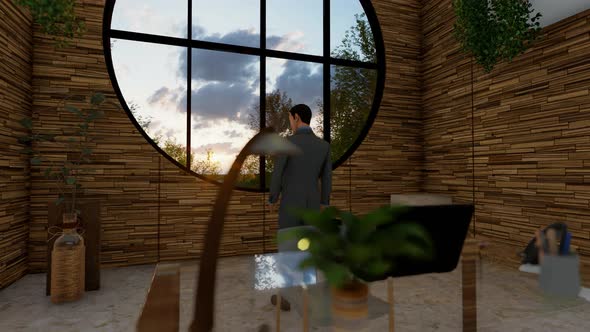 Businessman Looking At Sunrise From His Office alt