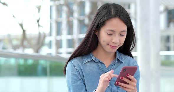 Young woman use of mobile phone