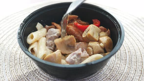 Homemade Cooked Chicken Mushroom Pasta in a Bowl