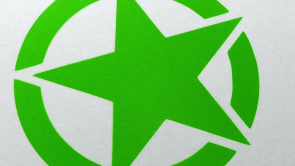 Green Star Graphic Spray Painted Onto Surface