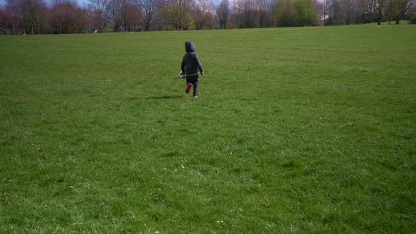 Happy Family Of Children Having Fun In Spring Park