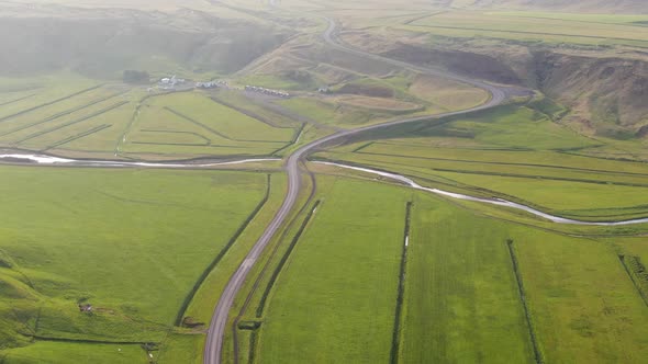 Green fields and ring road in Iceland seen from above