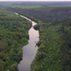 View of the river from above. Flight over water and forest trees from a height - VideoHive Item for Sale