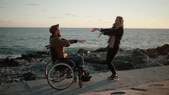 Happy Dance of the Girl and Her Disable Boyfriend