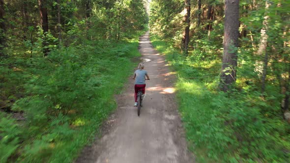 Young Cyclist Riding on a Nice Road