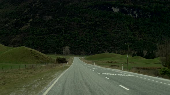 A first person view of driving through the beautiful country of New Zealand