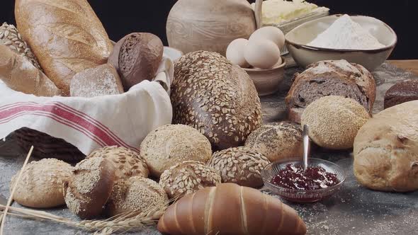 Different Types of Fresh Baked Dutch Bread is on the Wooden Table