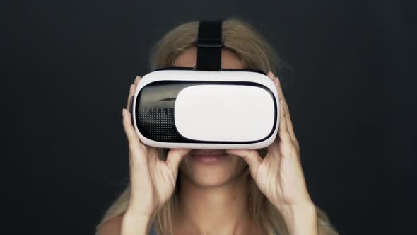 Woman using virtual reality simulator