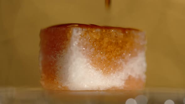 Drops of Bitter Falls to the Lump Shugar in Slow Motion Making of the Old Fashioned Full 240 Fps