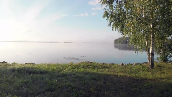 Slow movement towards a calm lake.