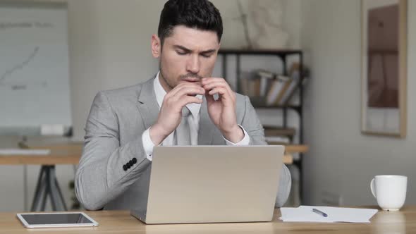 Headache Stressed Businessman Working on Project