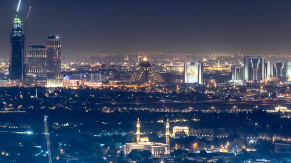 Aerial View to Deira District with Airport Timelapse