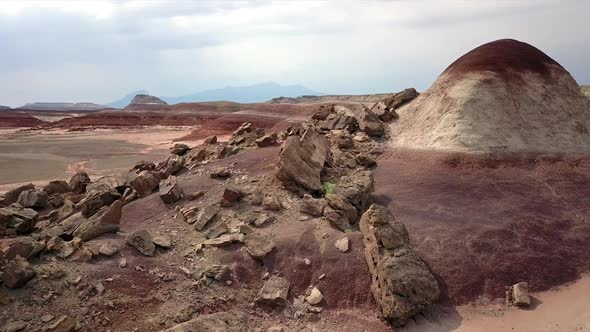 Aerial view of Mars like terrain flying over rocks in the desert