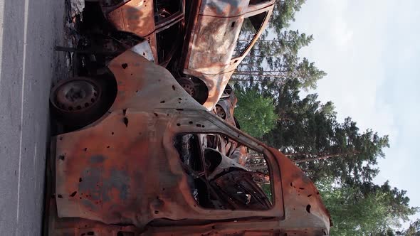 Vertical Video of Burnt Cars During the War in Ukraine