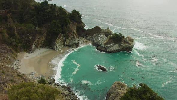 McWay Beach and McWay Falls. Big Sur, California, USA. Aerial View