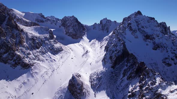 Drone View of the High Snowy Peaks of Kazakhstan