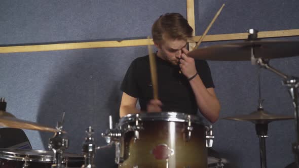 Handsome Drummer Enjoy Repetition in Garage