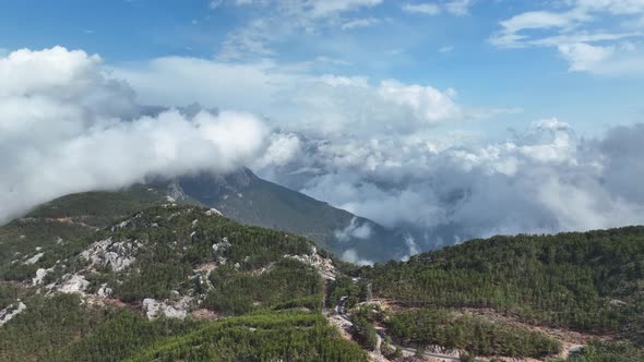 Cloudy landscape high in the mountains aerial view 4 K