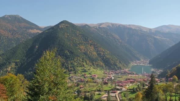 Young Woman on a Swing with the View of the Uzungol Town Near Trabzon Turkey