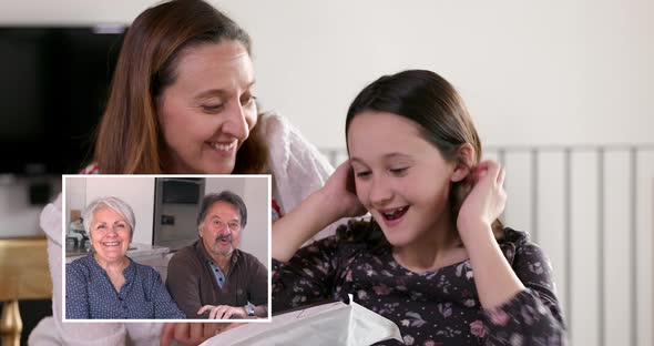 Mother giving gift to daughter