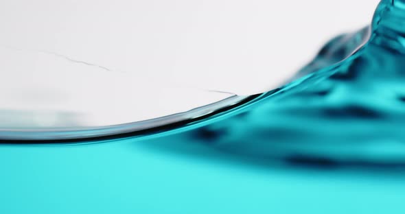 Blue Water Surface in Motion With Waves Creating Abstract Shapes