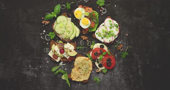 Healthy Vegan Sandwiches Made From Homemade Buckwheat Bread with Various Toppings