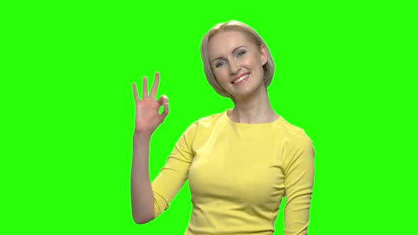 Happy Mature Woman Giving Ok Gesture