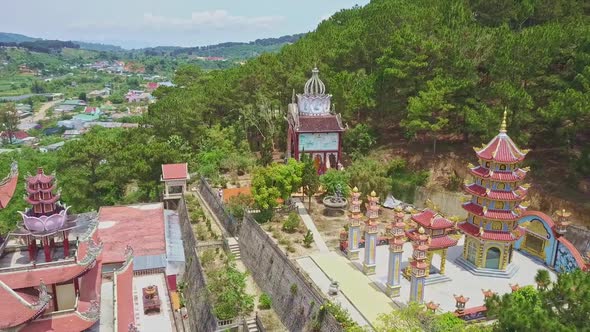 Aerial View Buddhist Temple Complex Among Mountains alt