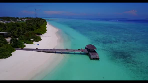 Aerial drone shot tourism of paradise coastline beach journey by turquoise sea with white sand backg