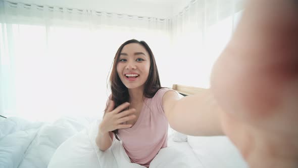 Woman using smartphone conference