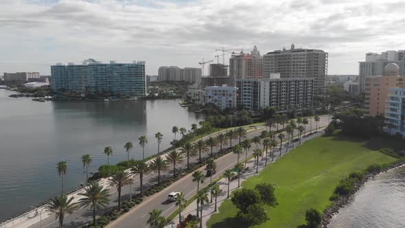 Aerial view of palm tree-lined John Ringling Causeway in Sarasota, Florida.  The Gulf Coast of Flori