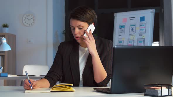 Businesswoman Calling on Smartphone at Dark Office 48