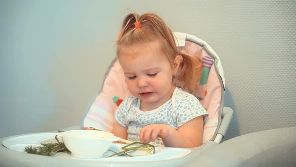 Children Sitting In Chair Kindergarten Eating Supplementary Healthy Food For Toddlers. Baby Eating.