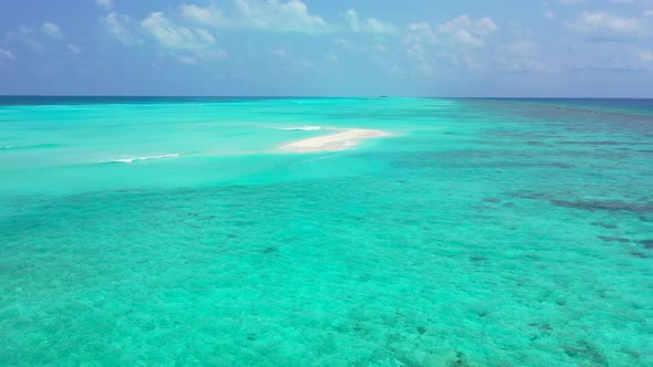 Luxury fly over clean view of a summer white paradise sand beach and blue ocean background in colorf