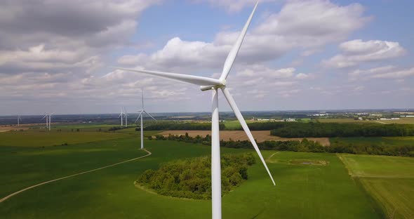 Aerial footage of wind energy converters at a wind farm