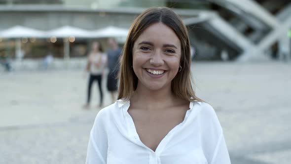 Beautiful Brunette with Long Hair Smiling