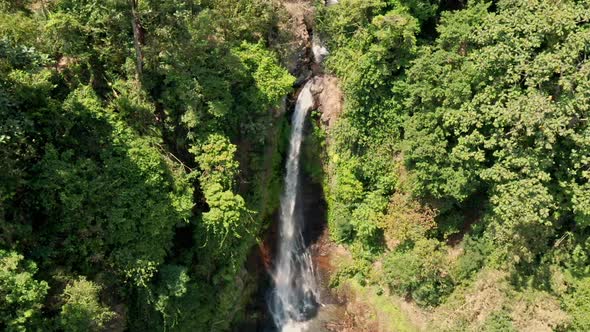 Drone Over Forest To Large Bali Waterfall