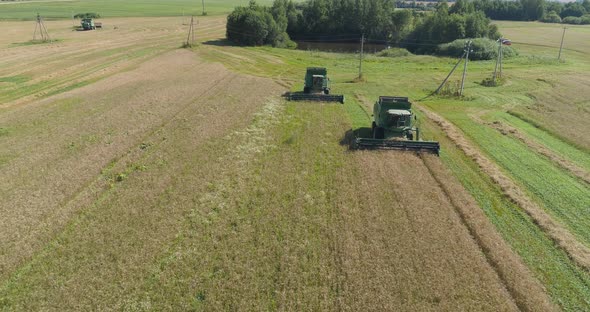 Combine Harvester on Wheat Field