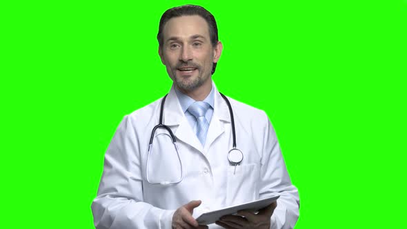 Handsome Friendly Male Doctor with Tablet