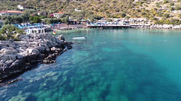 Drone shot of a beach at the mediterranean sea.