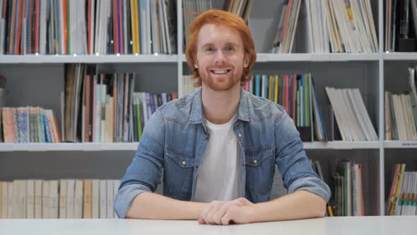 Portrait of Smiling Man with Red Hairs