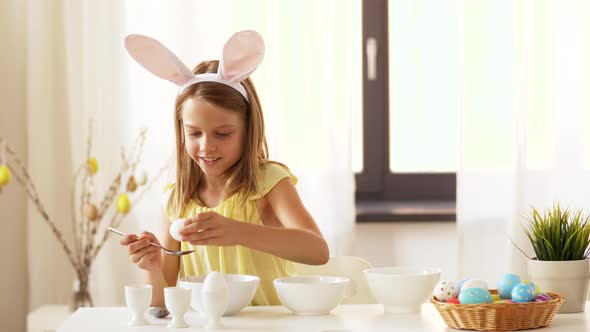 Girl Coloring Easter Eggs By Liquid Dye at Home