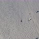 Aerial View Snow Mountain Peak Clouds in Background  Winter Drone Footage Ski Resort - VideoHive Item for Sale