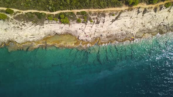 Lonely Rocky Coastline With Footpath. Aerial Footage