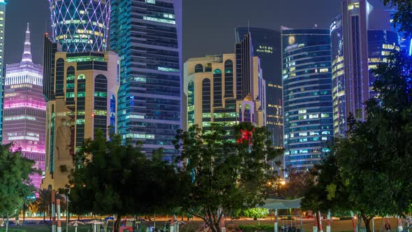 The Skyline of Doha By Night with Starry Sky Seen From Park Timelapse Qatar